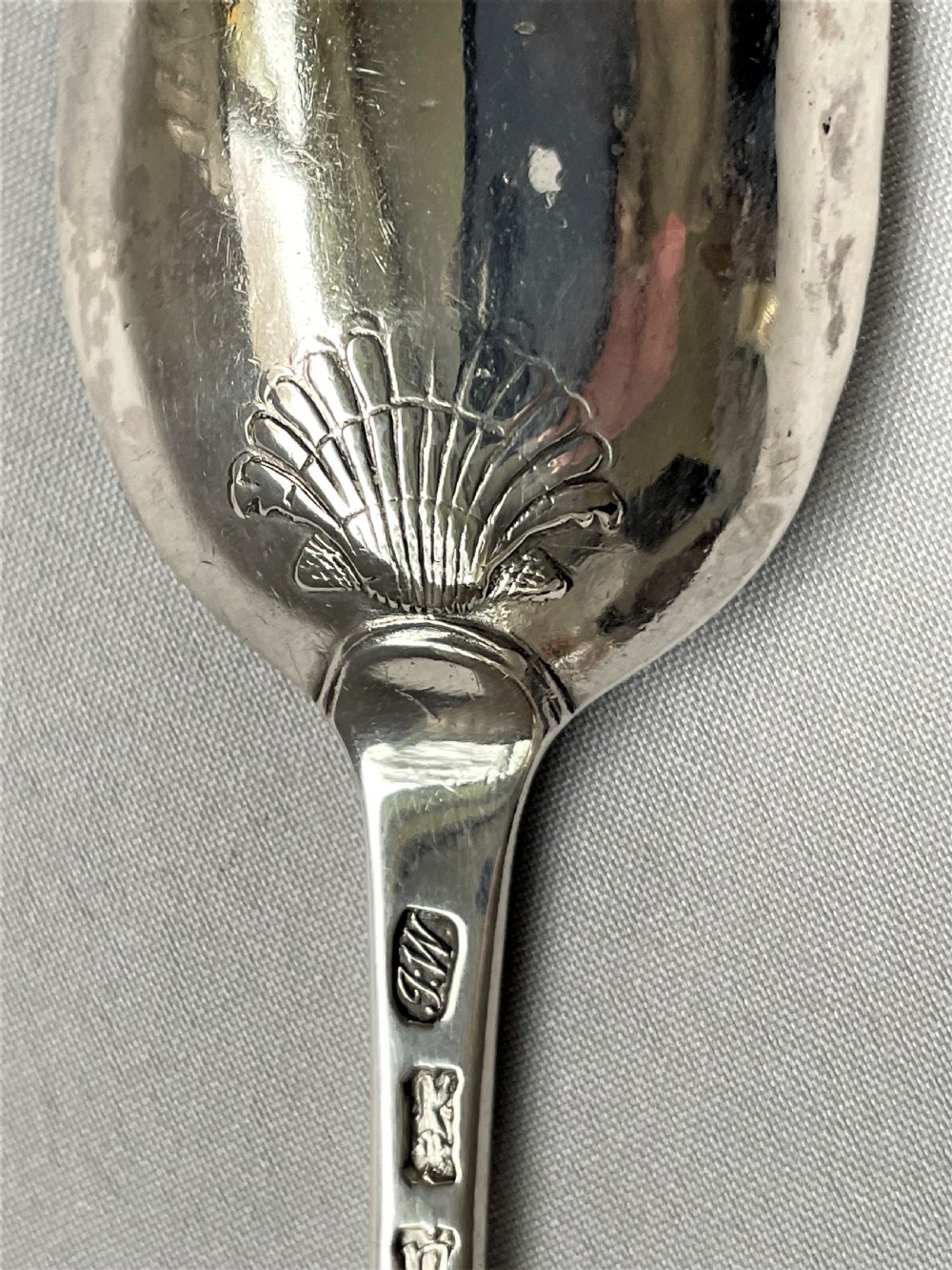 A lovely 18th Century silver shell-back tablespoon View VI