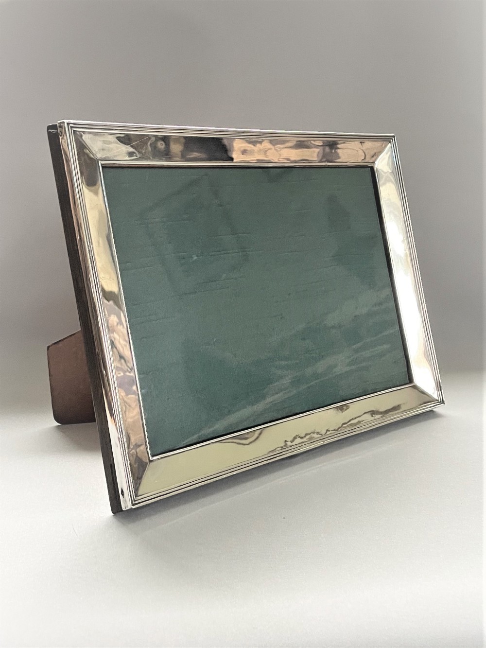 A large and stylish landscape/portrait silver photo frame