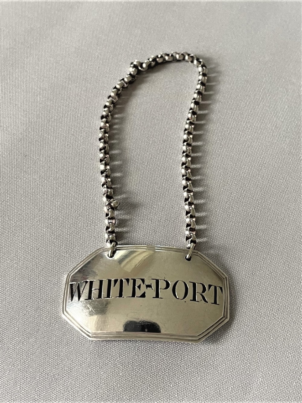 A rare Georgian White port silver label
