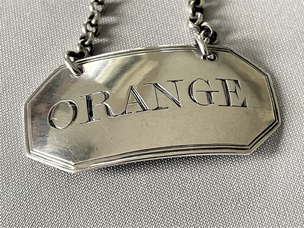 A lovely Georgian silver 'Orange' decanter label View II