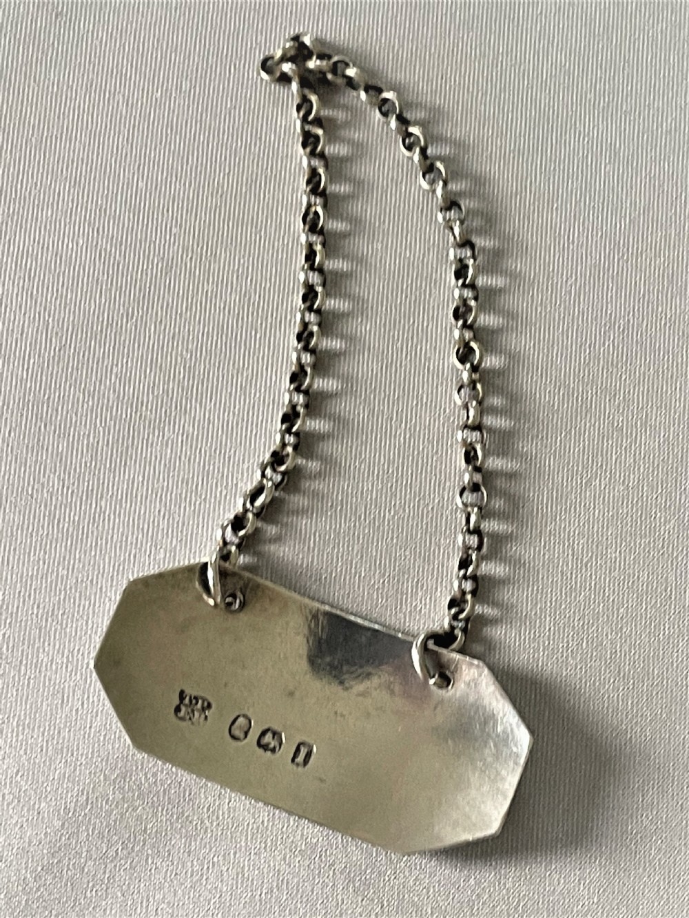 A lovely Georgian silver 'Orange' decanter label View III