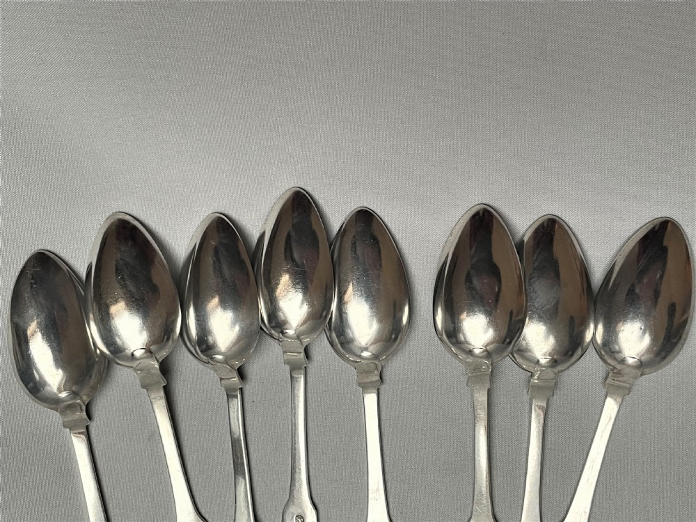 A set of 8 18th Century silver Fiddle & Thread pattern teaspoons View V
