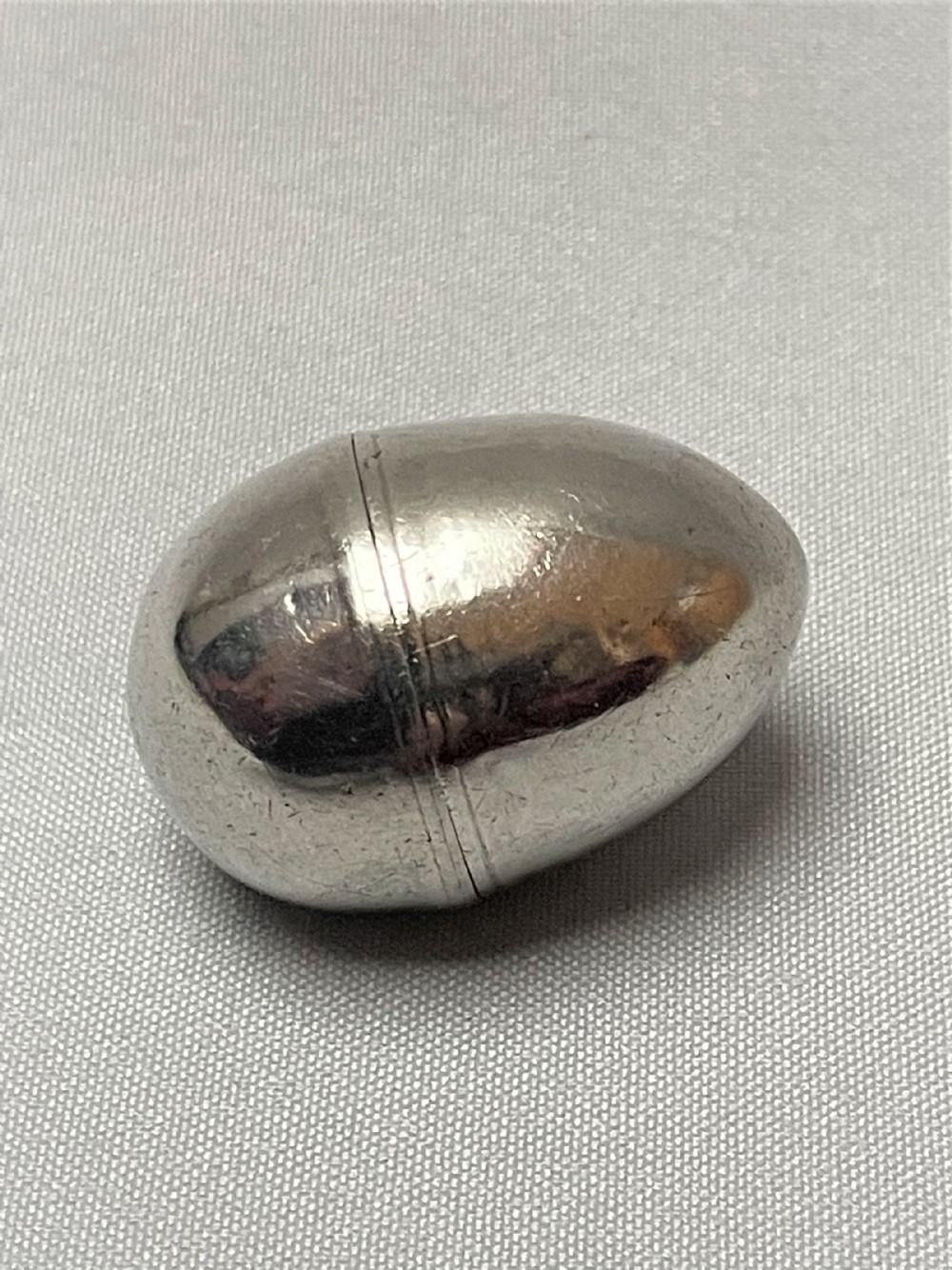 A Georgian silver 'egg' nutmeg grater