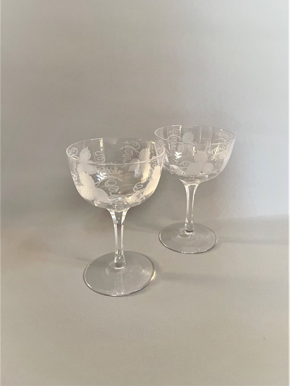 A pair of vine etched Victorian champagne bowls