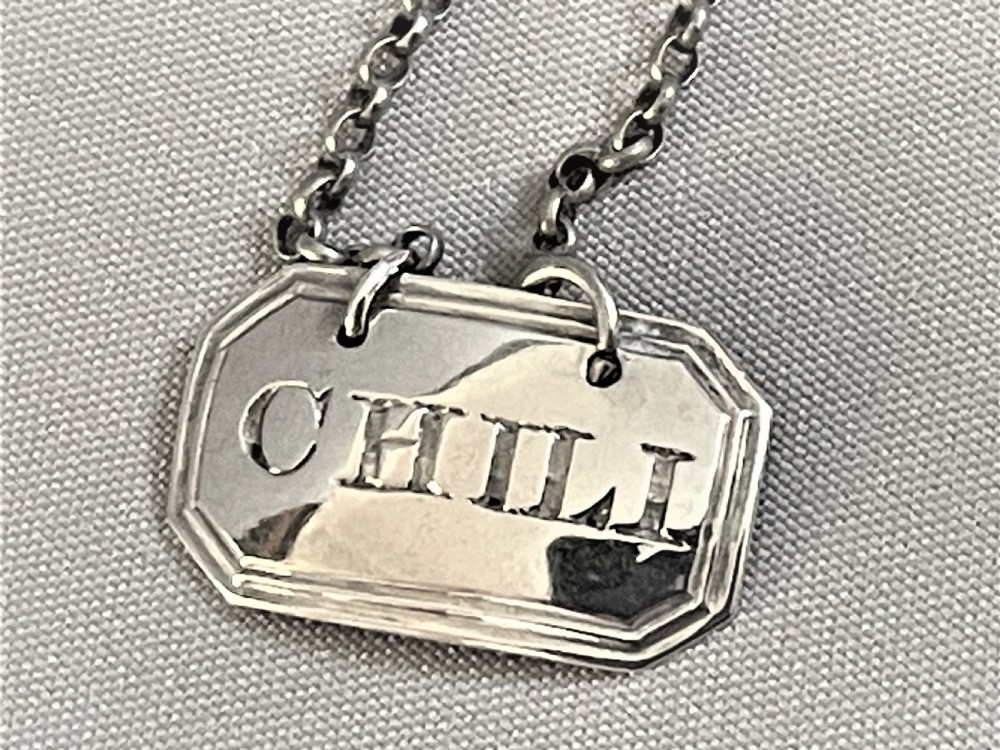 A rare Georgian silver 'Chili' sauce label View III