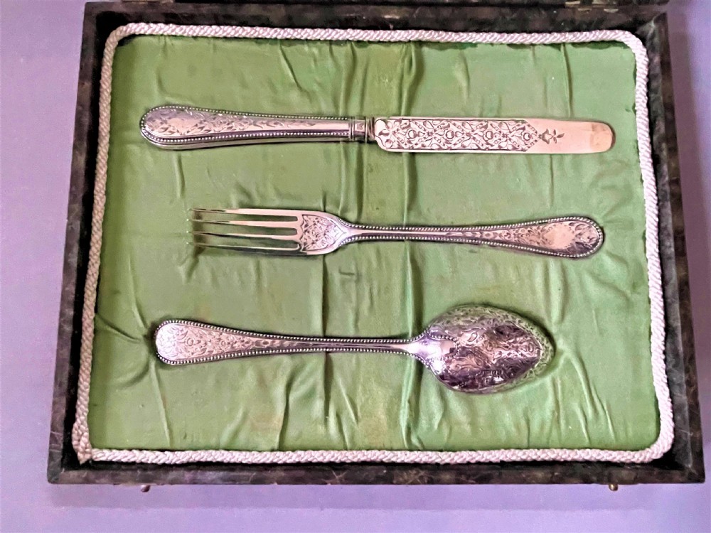 A lovely mid Victorian silver Christening set View II
