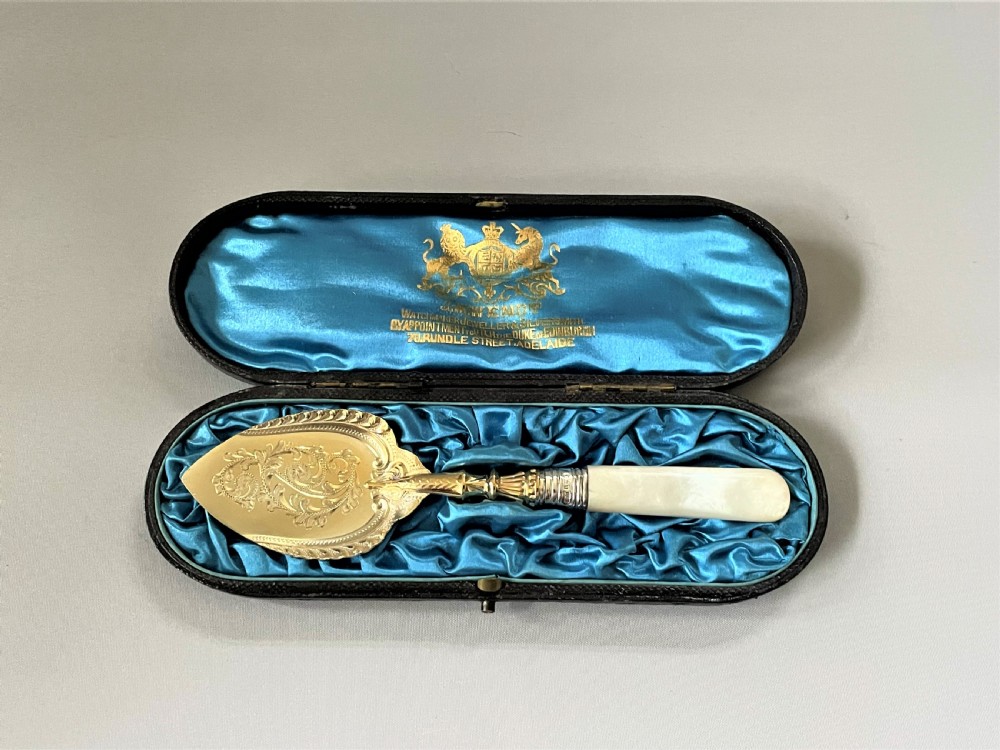 A superb Edwardian silver gilt preserve spoon