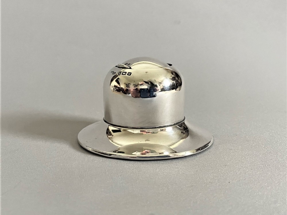 An unusual novelty 'hat' silver inkwell