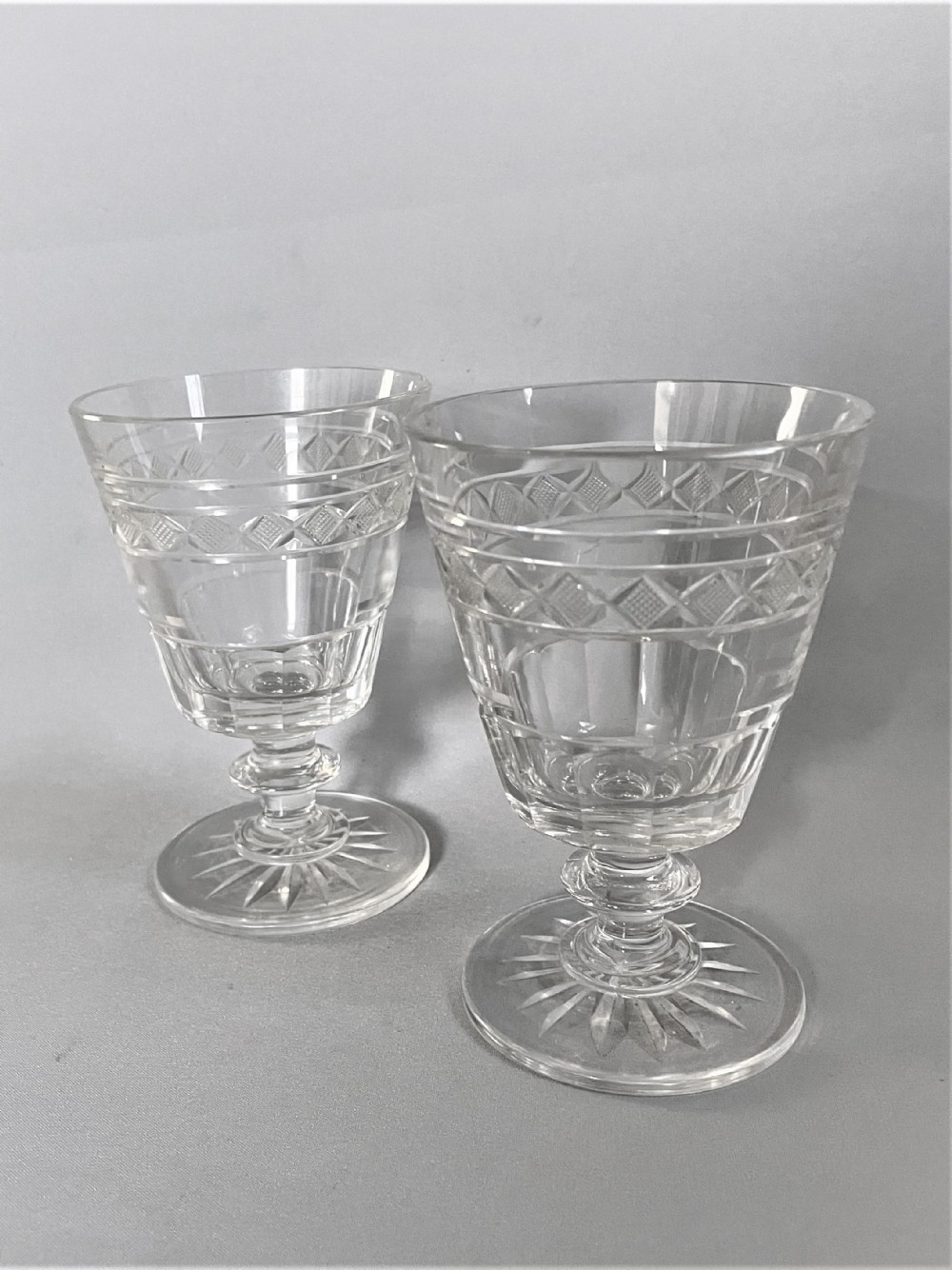 A pair of Georgian revival cut glass wine rummers