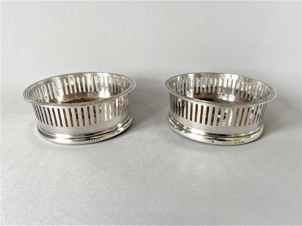 A Lovely Pair Of Asprey Small Silver Coasters View III