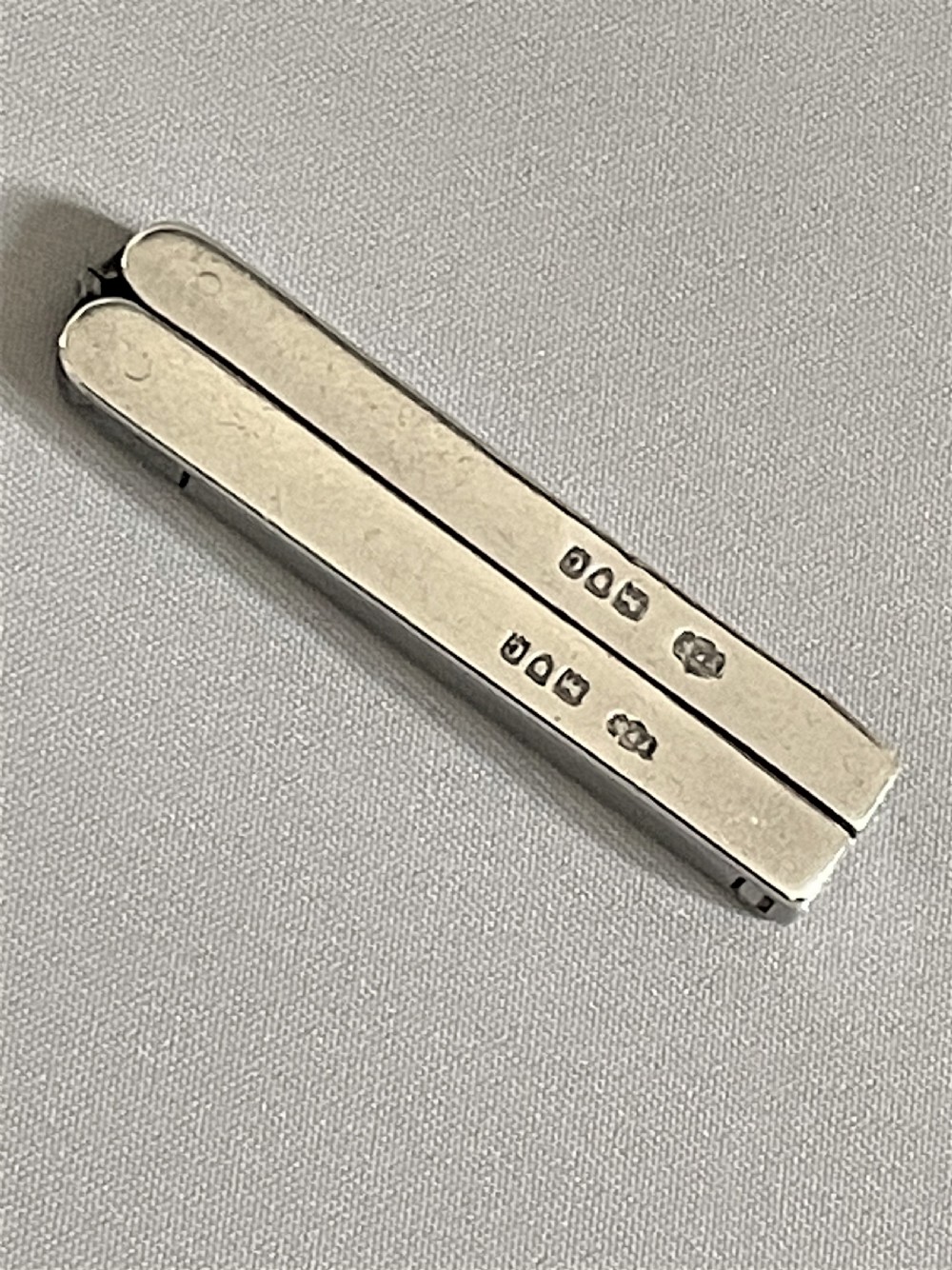 A pair of silver handled Victorian 'Campaign' folding scissors View II
