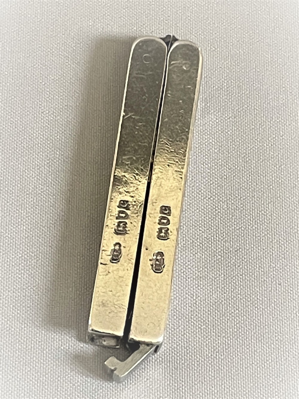 A pair of silver handled Victorian 'Campaign' folding scissors View IV