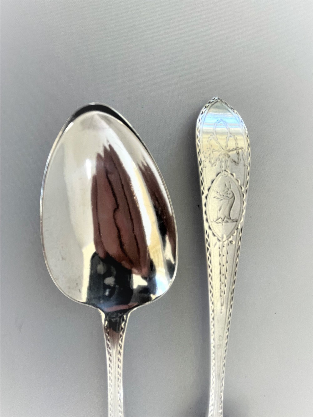 A superb pair of Irish bright cut silver serving spoons View III