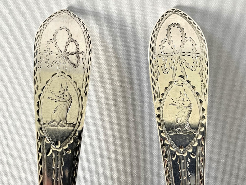 A superb pair of Irish bright cut silver serving spoons View VII