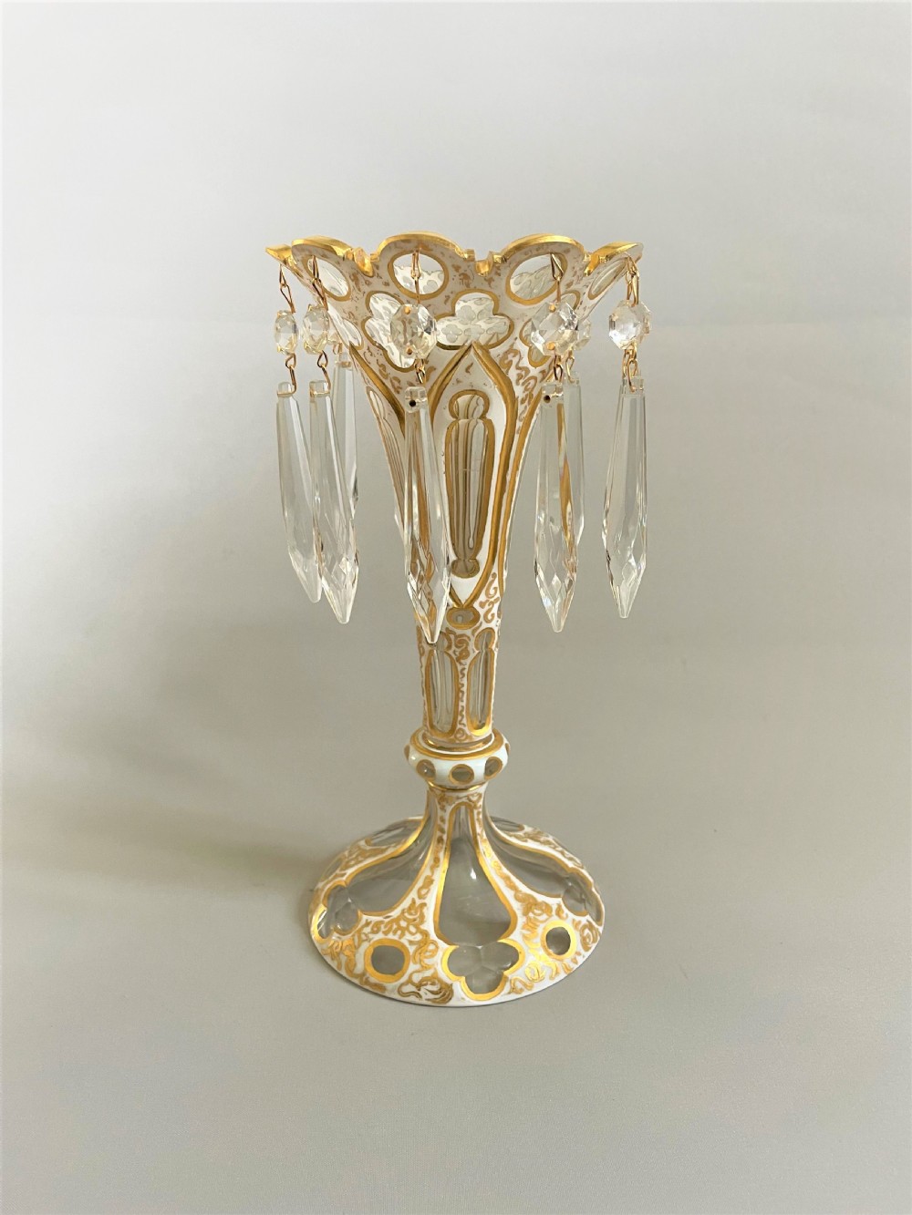 A superb Bohemian cut & gilded lustre vase