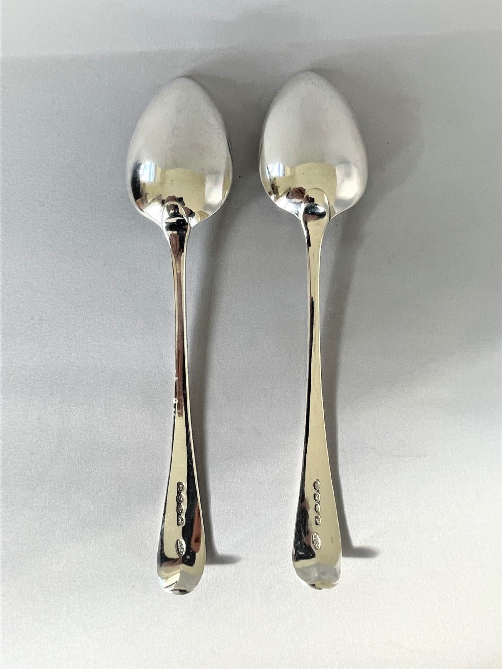 A good pair of Georgian silver serving/table spoons View V