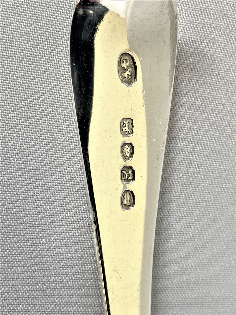 A good pair of Georgian silver serving/table spoons View VI