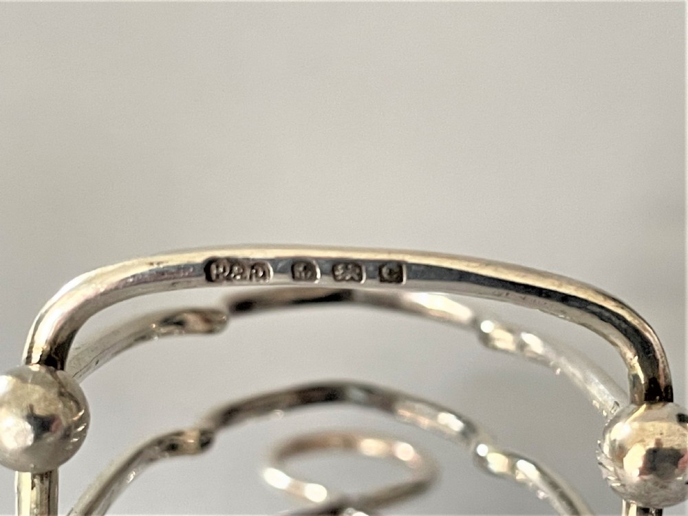 A gorgeous set of four silver breakfast toast racks View IV