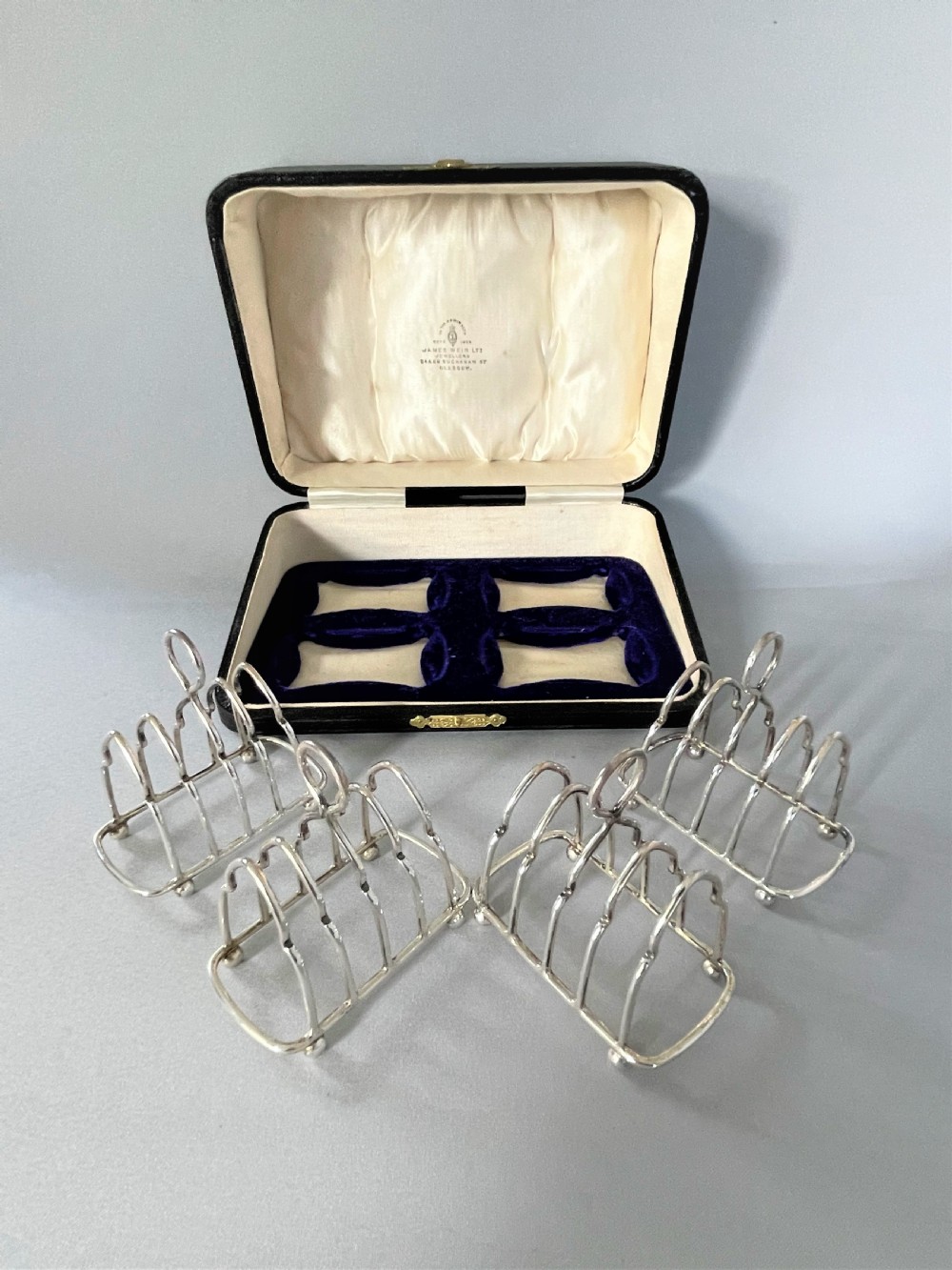 A gorgeous set of four silver breakfast toast racks View V