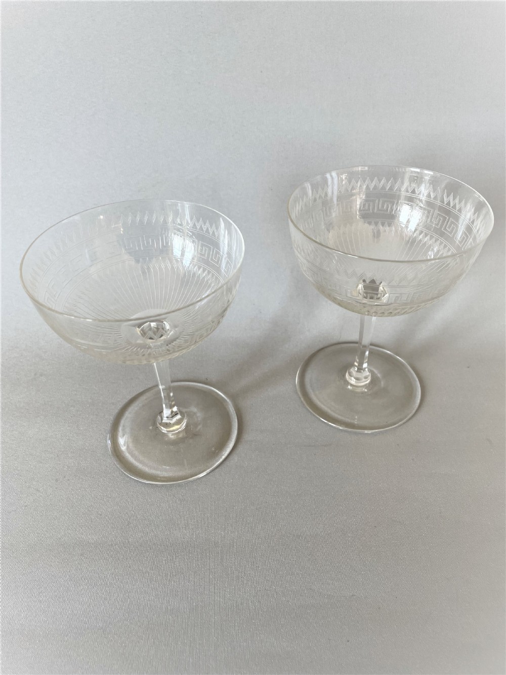 A gorgeous pair of Victorian etched champagne coupes  View II