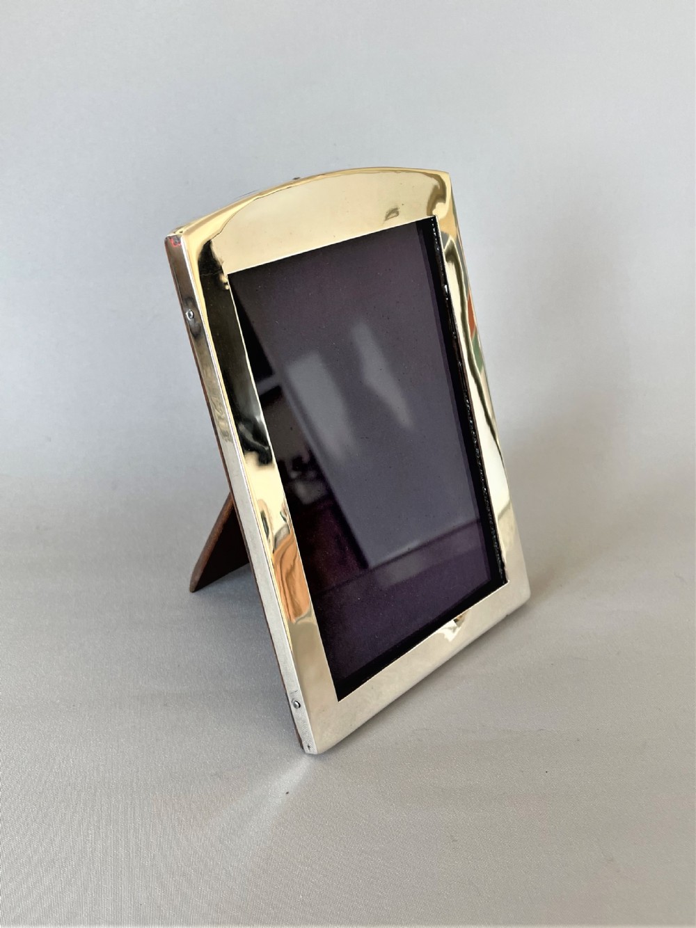 A handsome and shaped silver photo frame