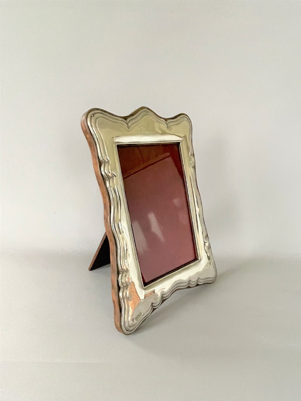 A gorgeous shaped silver photo frame