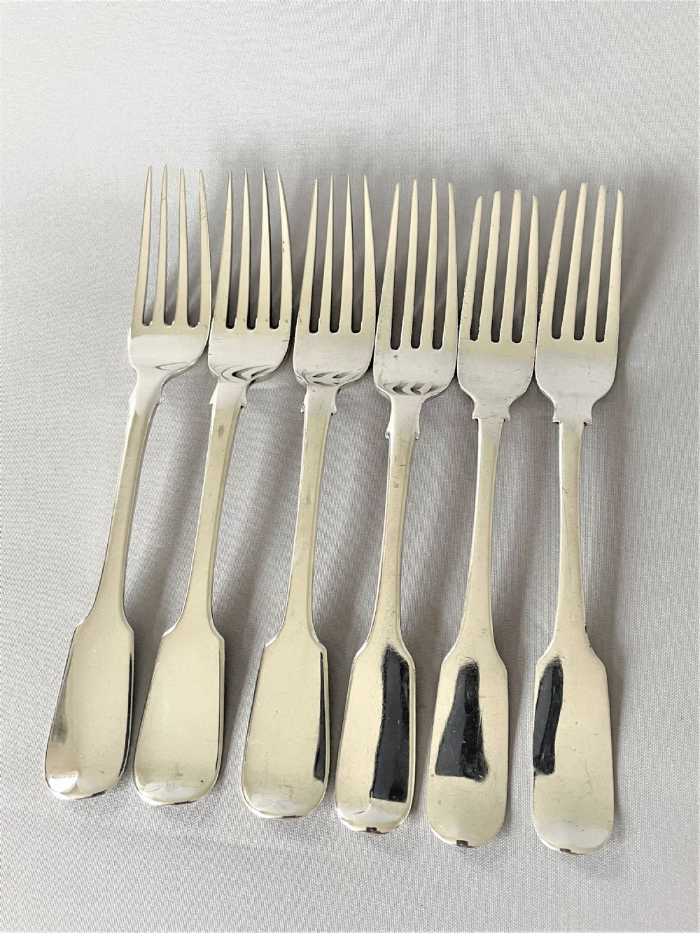 A harlequin set of 6 Irish silver dessert forks