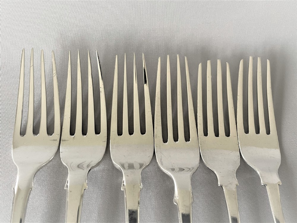 A harlequin set of 6 Irish silver dessert forks View II