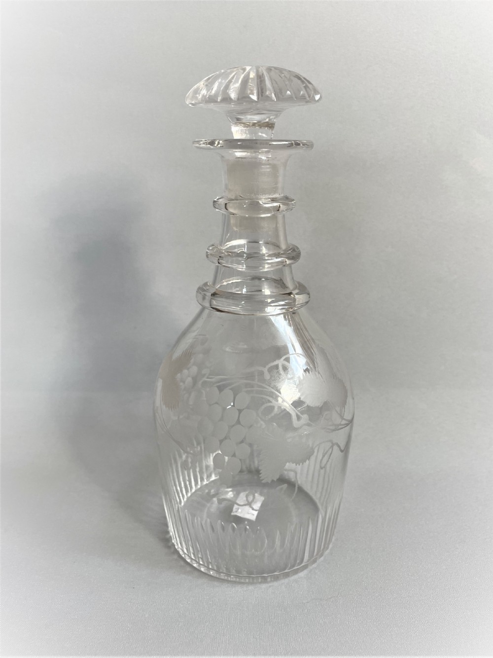 A delightful Georgian etched spirit decanter