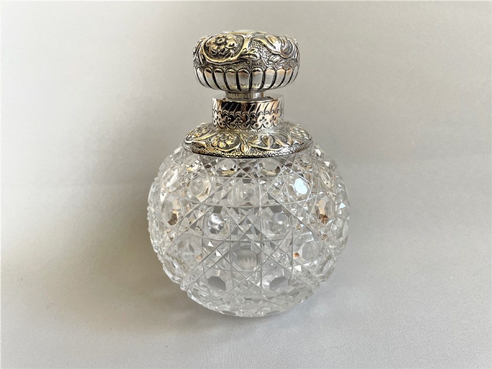 A fabulous Victorian silver mounted cologne bottle View III