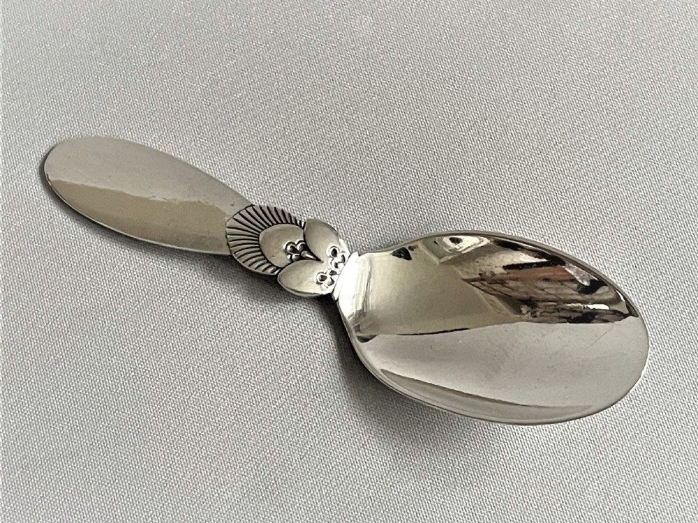 A vintage Georg Jensen silver caddy spoon