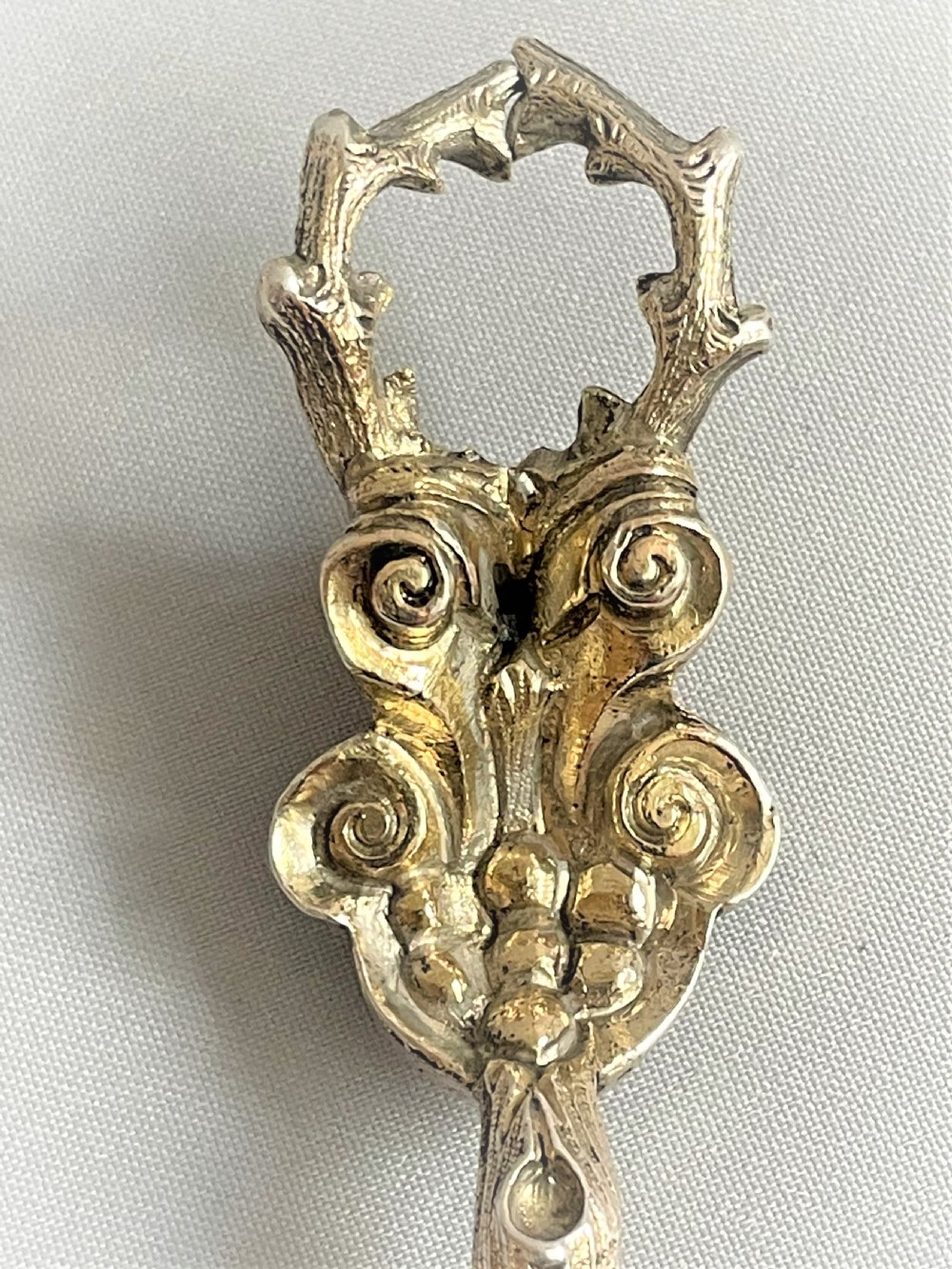 A spectacular quality pair of German silver gilt serving spoons View VI