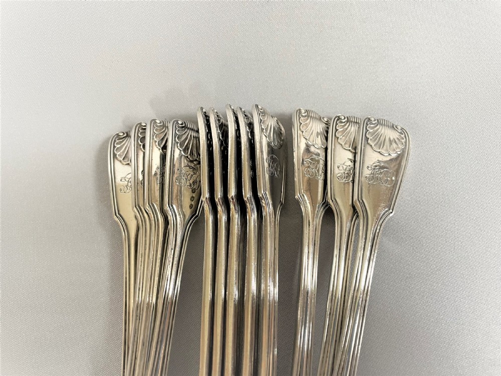 A superb set of 12 Victorian silver Fiddle, Thread & Shell teaspoons View III