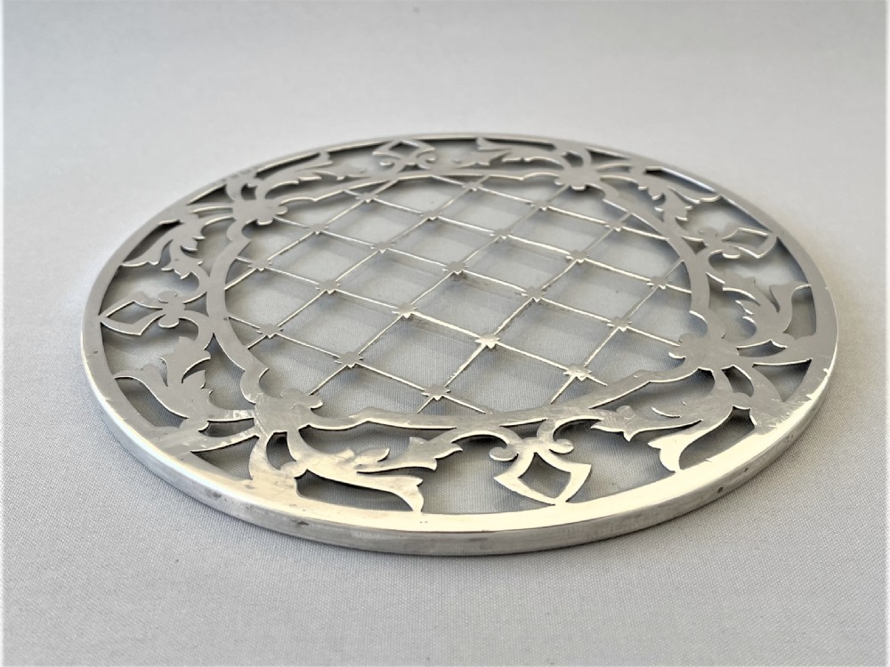 A lovely silver cased teapot stand View II