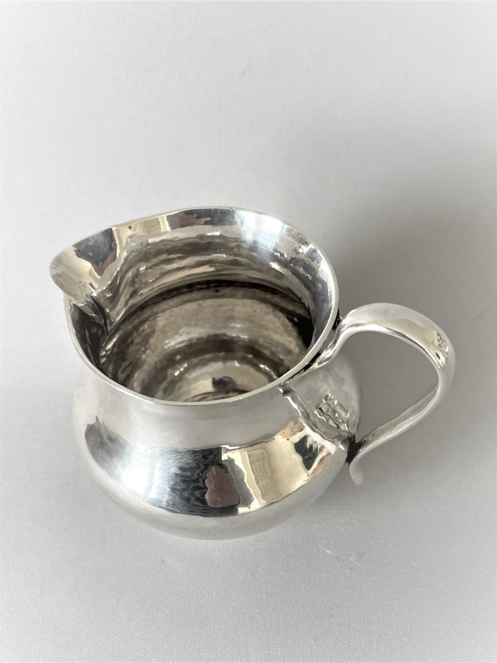 A Chester silver Arts & Crafts cream jug View III