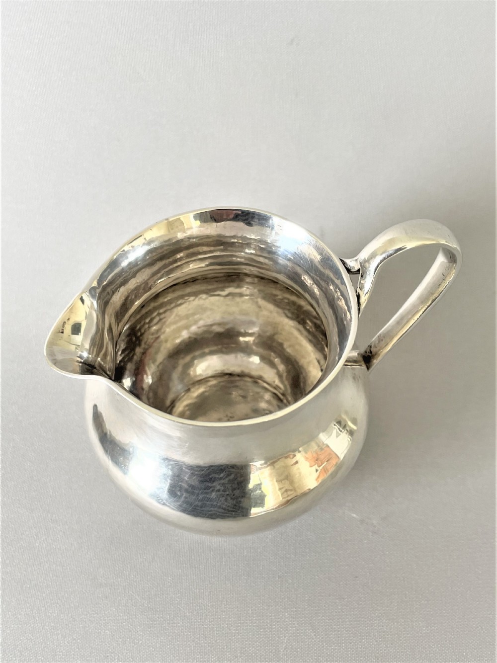 A Chester silver Arts & Crafts cream jug View IV
