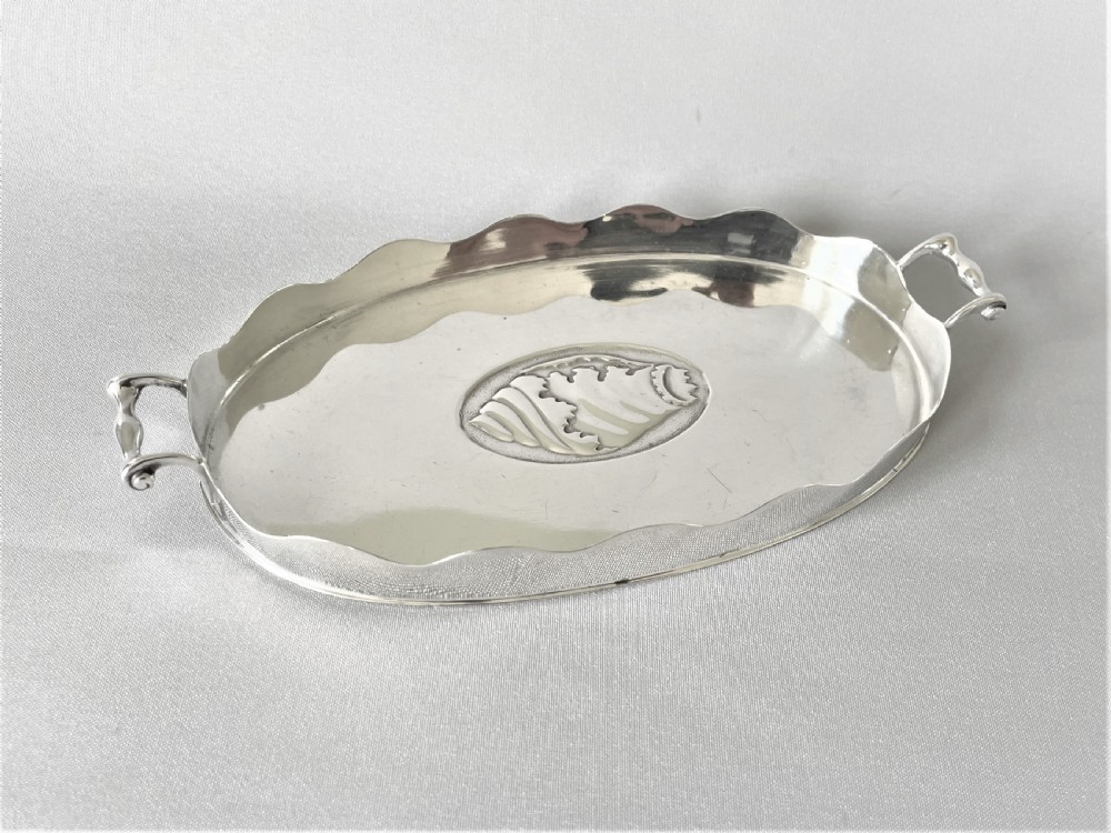 An unusual Edwardian novelty silver card tray