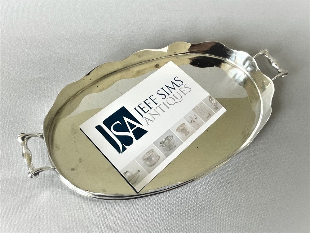 An unusual Edwardian novelty silver card tray View VII
