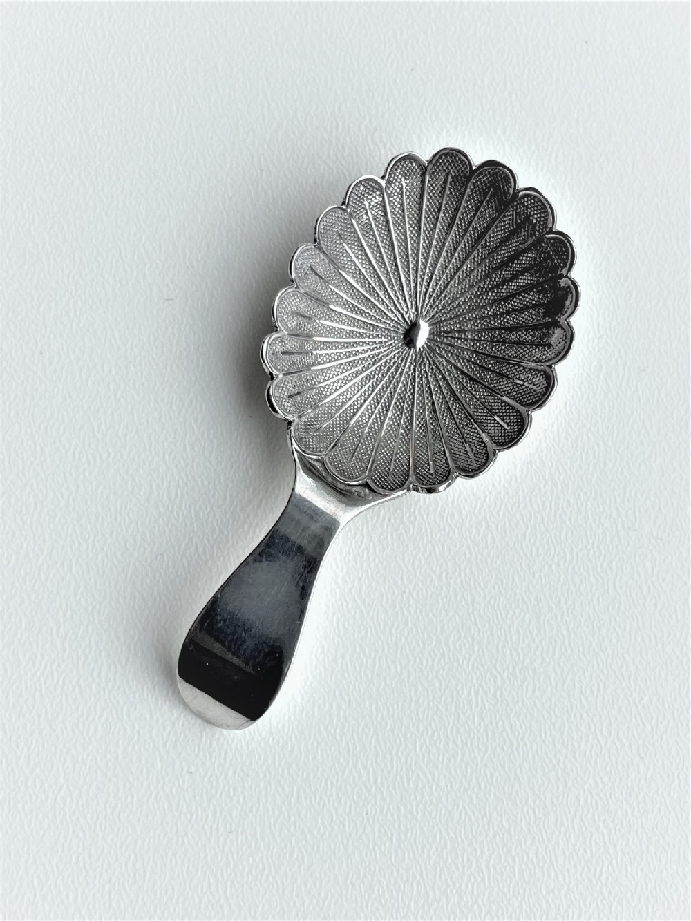 A most unusual Georgian silver caddy spoon
