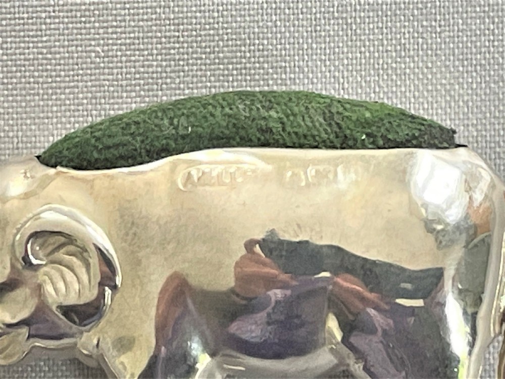 An Edwardian silver elephant pin cushion View IV