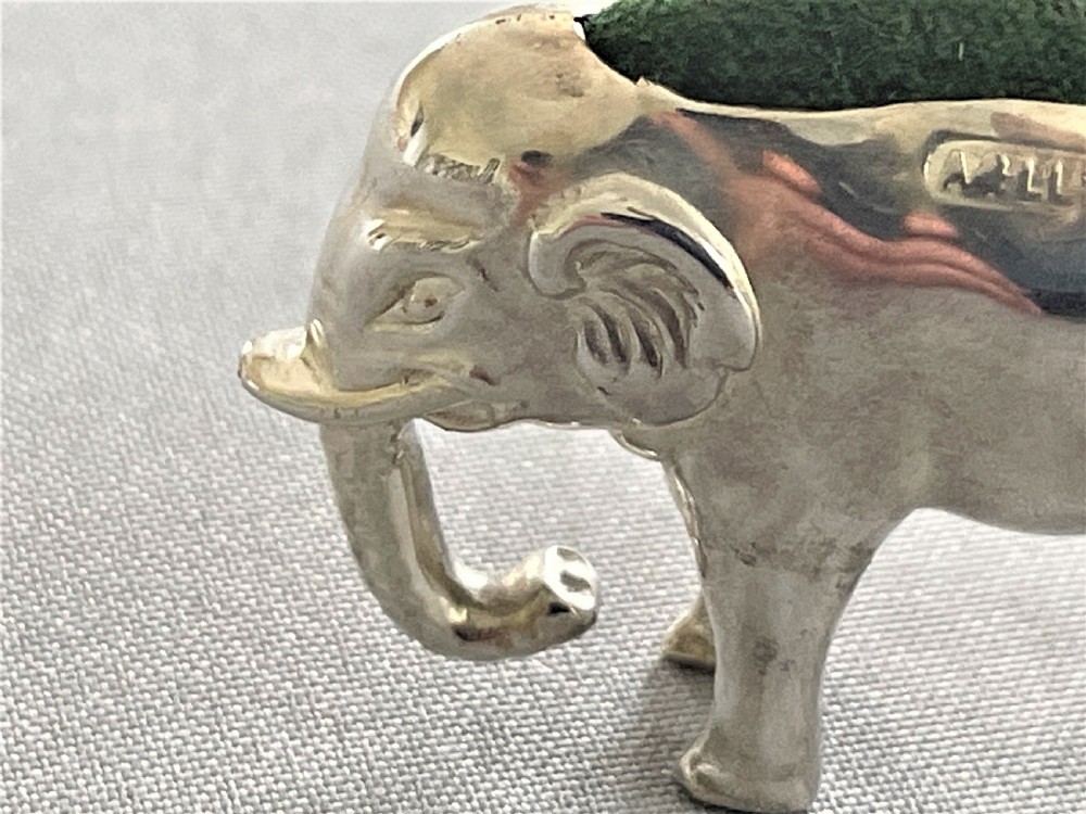 An Edwardian silver elephant pin cushion View VI