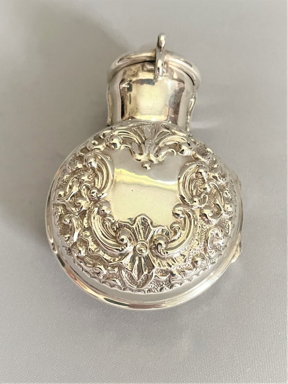 A stunning Edwardian silver cased 'lavender salts' bottle