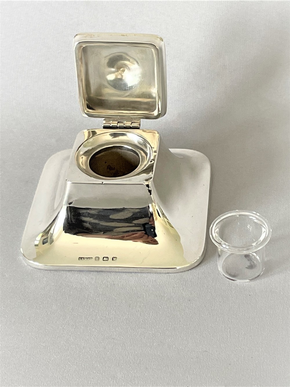 A stylish silver George V inkwell of squared form View IV