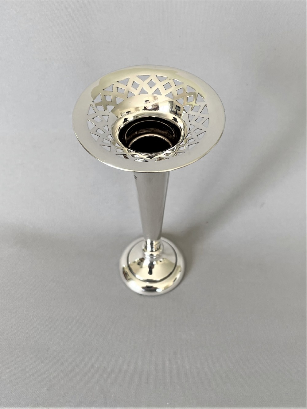 A pretty Edwardian pierced silver specimen vase