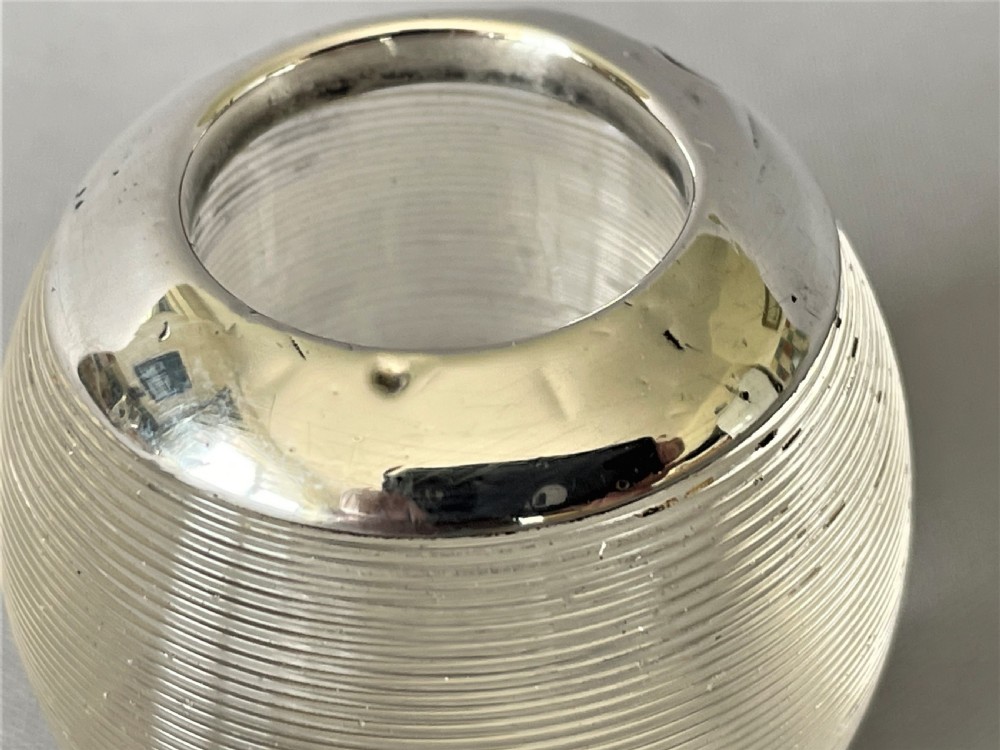 A petite novelty Edwardian silver match striker View II