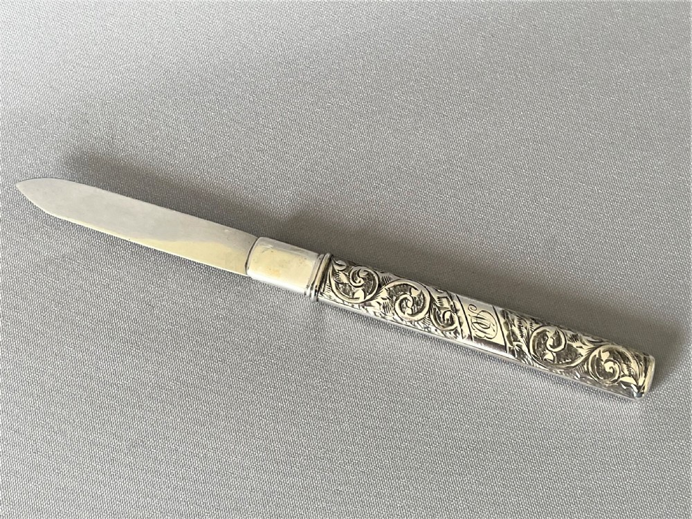 An unusual two part Edwardian silver fruit knife View III