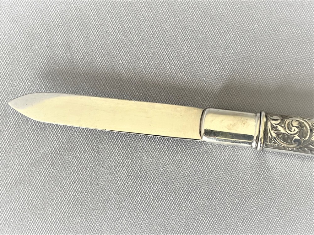 An unusual two part Edwardian silver fruit knife View IV