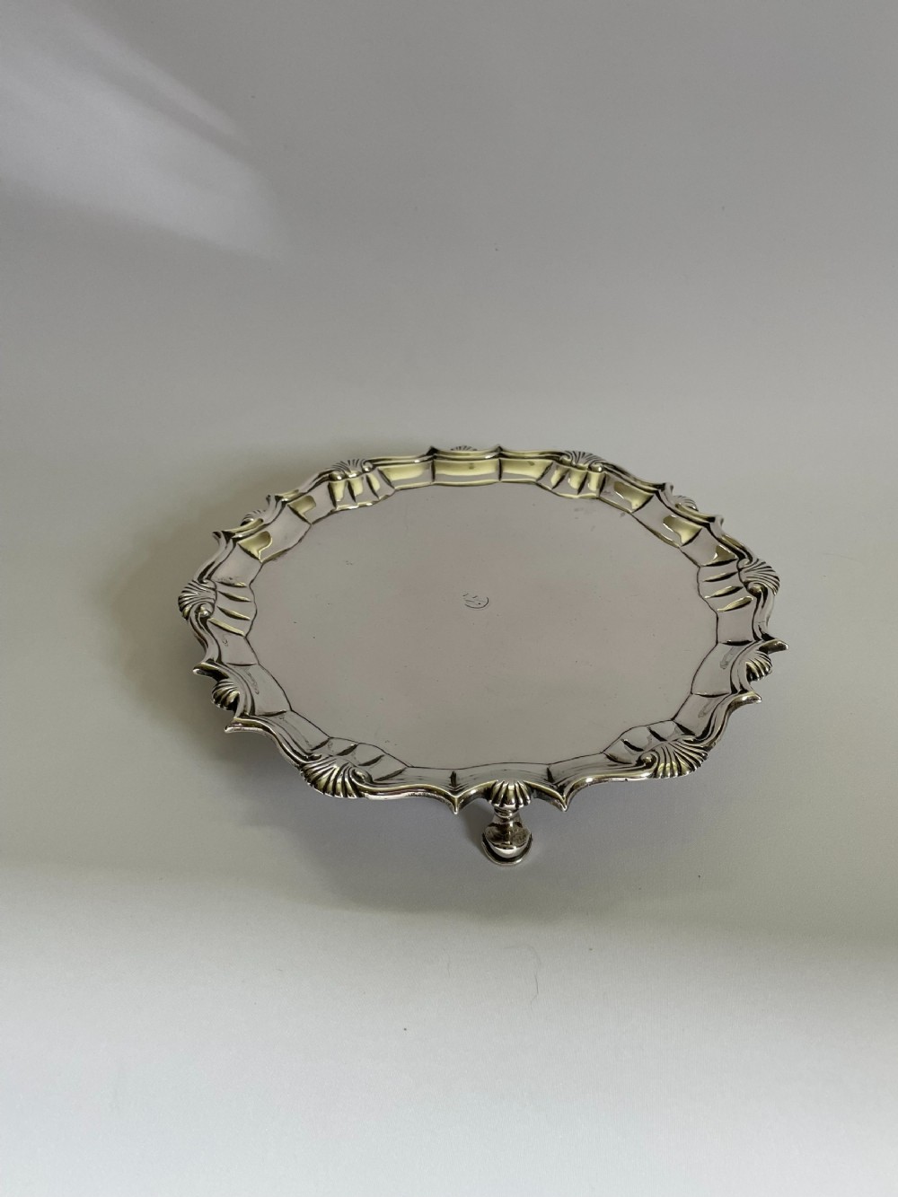 A superb early George II large silver card tray