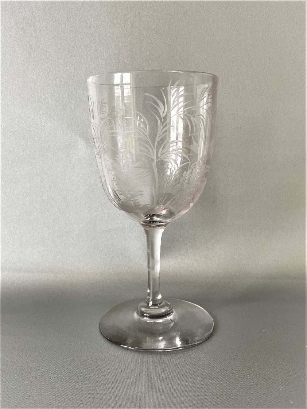 A gorgeous Victorian fish engraved wine goblet