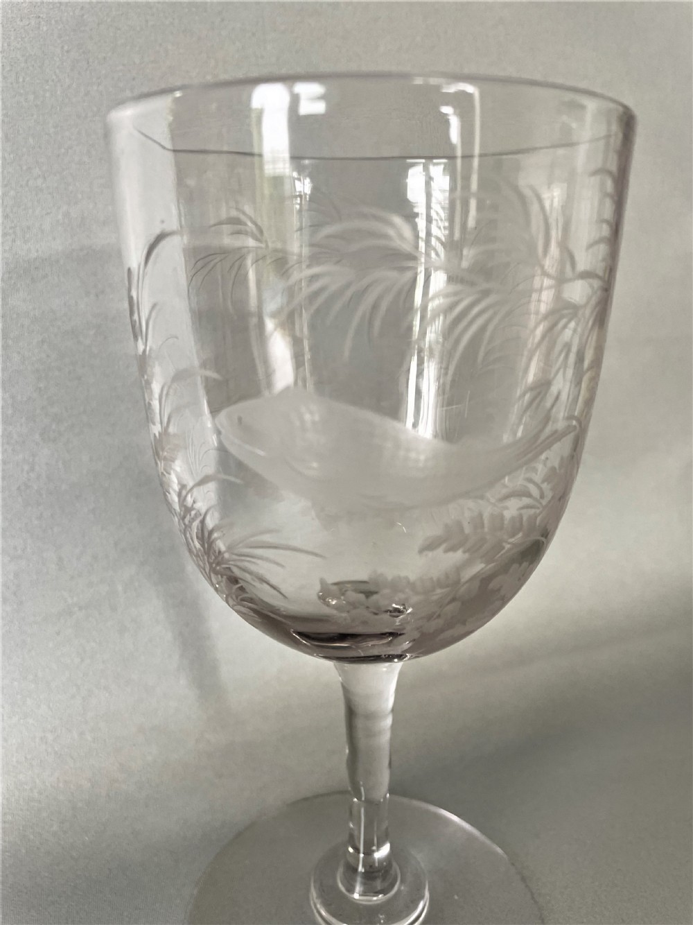 A gorgeous Victorian fish engraved wine goblet View II